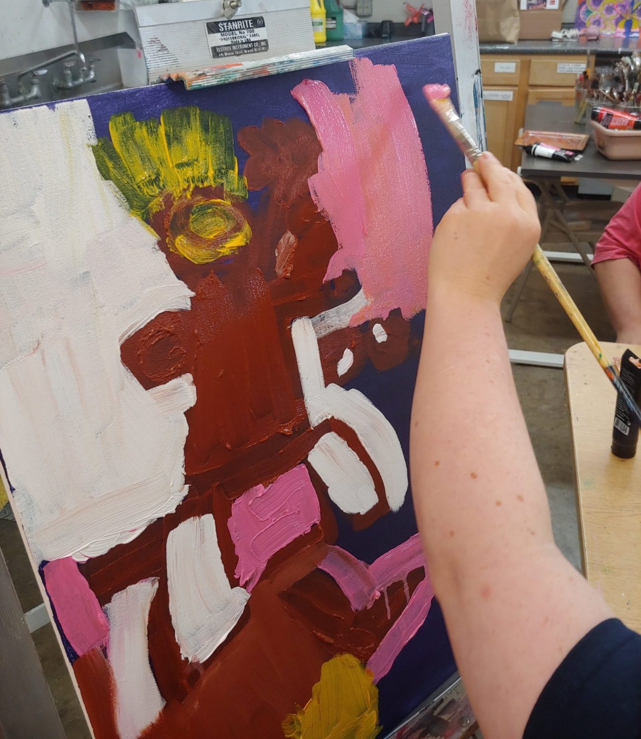 Photo of an abstract artwork being painted at ArtMix